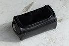 Black Garzini Toiletry Bag in a stylish bathroom lifestyle setting, perfect for organizing travel essentials.