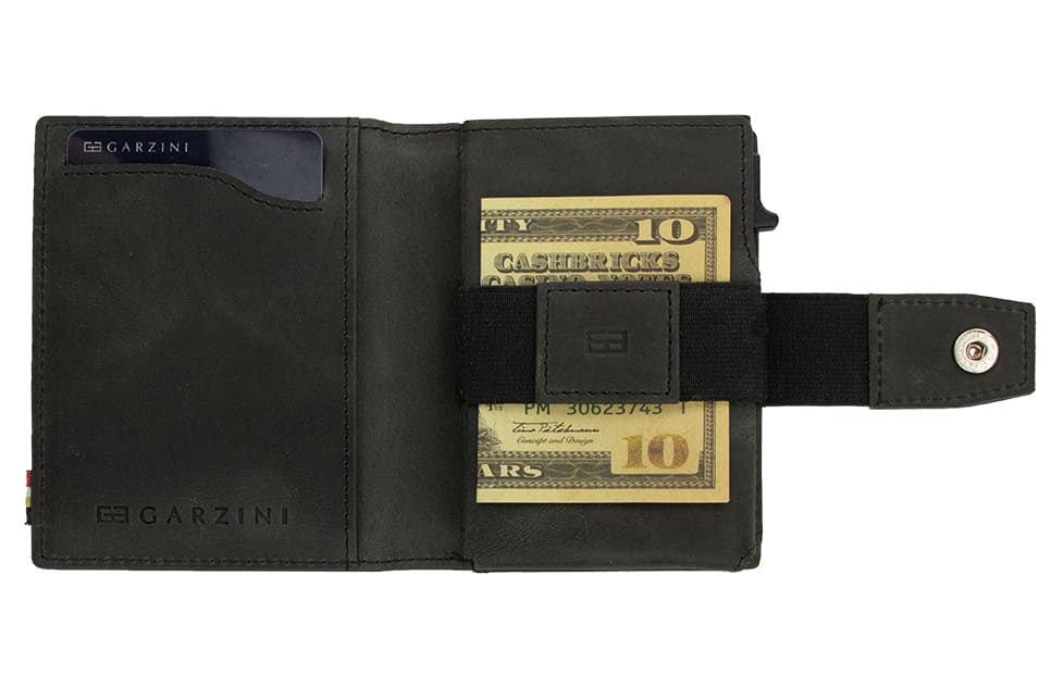 Open Garzini Metal Wallet in brushed black leather, displaying card and cash slots