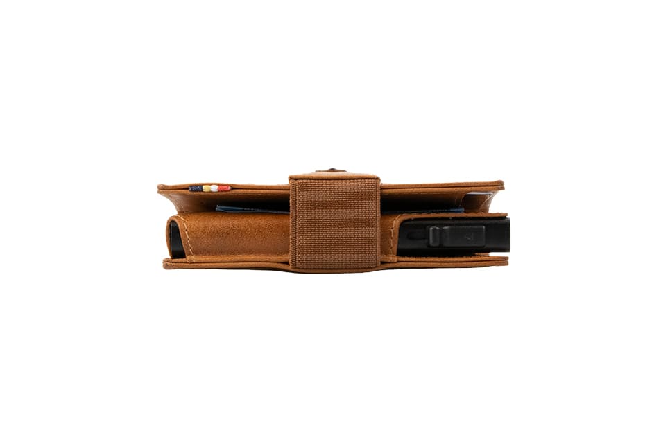 Side view of slim Garzini Metal Wallet in brushed cognac leather
