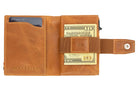 Open Garzini Metal Wallet in brushed cognac leather, holding a stack of cash
