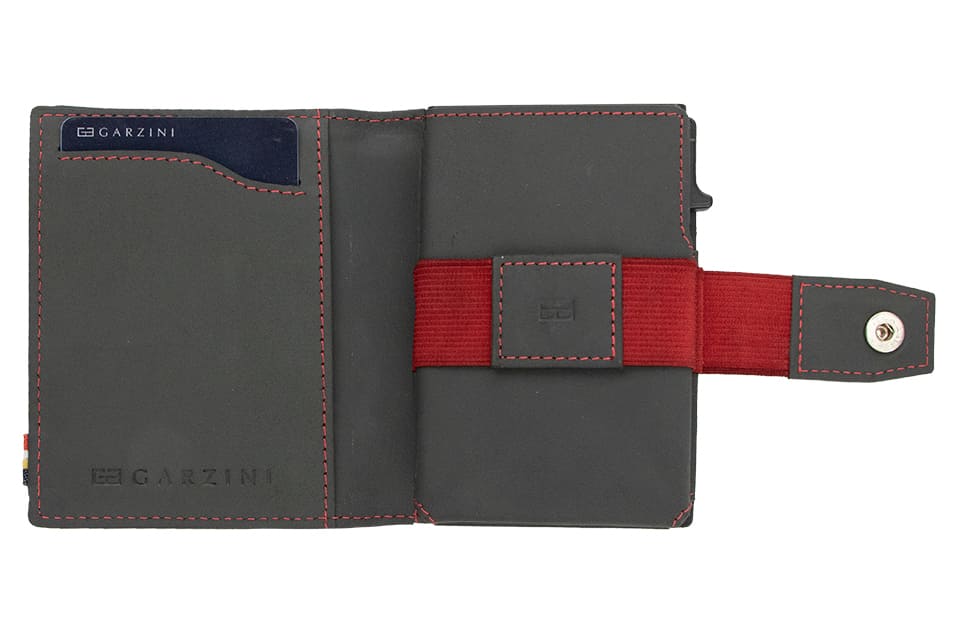 Open Garzini Metal Wallet in carbon red leather, displaying card and cash slots
