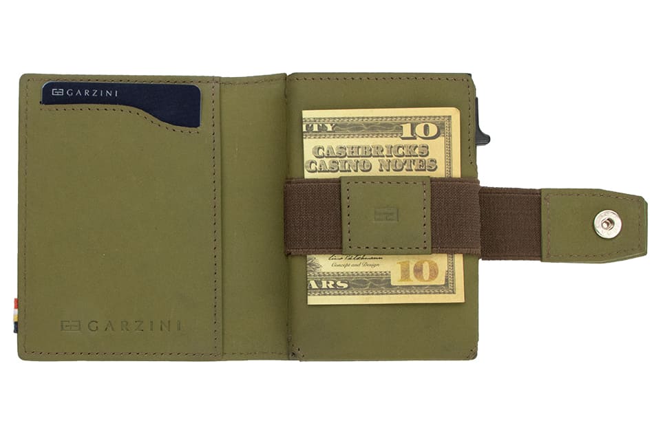 Open Garzini Metal Wallet in olive brown leather, holding a stack of cash
