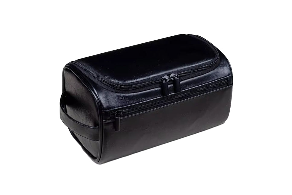 Black vegan leather Garzini Toiletry Bag, front side view for men's and women's travel.
