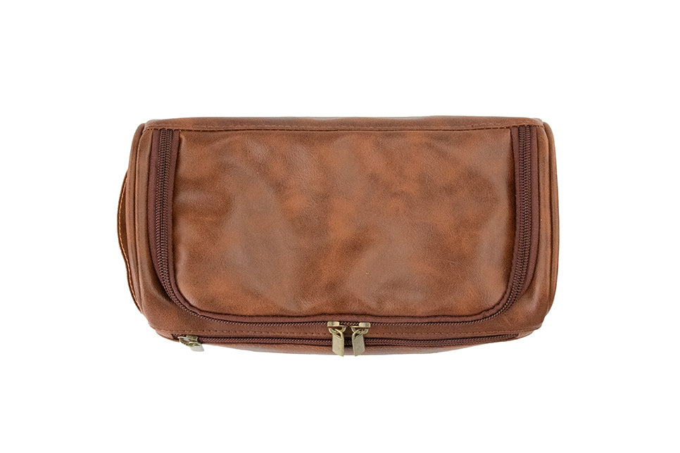 Overhead view of Brown Garzini Toiletry Bag, featuring spacious interior and waterproof lining for travel ease.